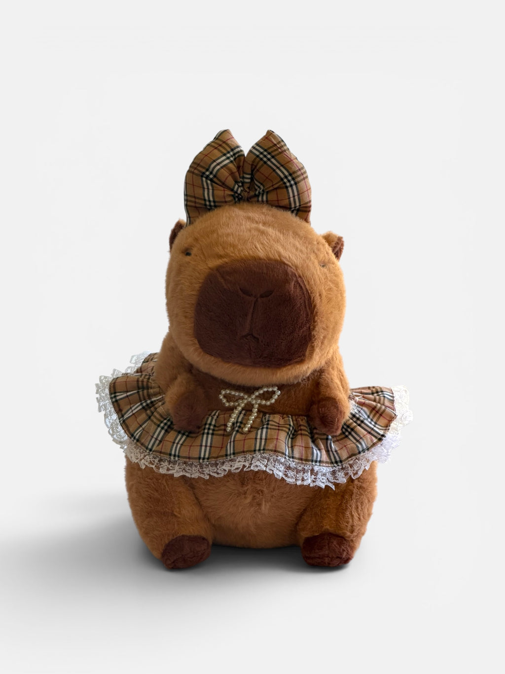 Capybara plush toy with plaid bow and skirt 
