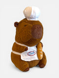 Plush Capybara wearing a chef's outfit with a chef's hat and apron on a white background