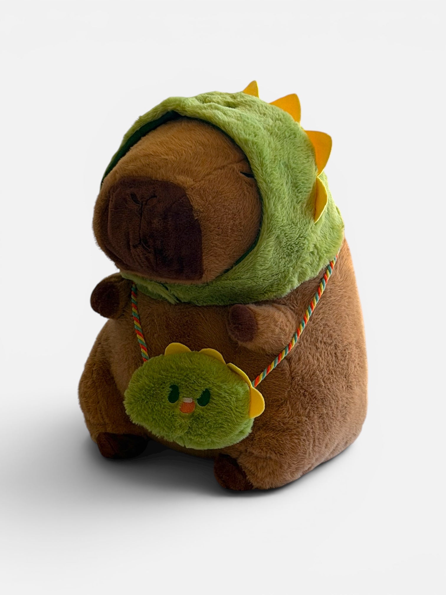 Plush Capybara with Dinosaur het and dinosaur purse