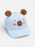 Light blue cap with bear ears and face on a light gray background
