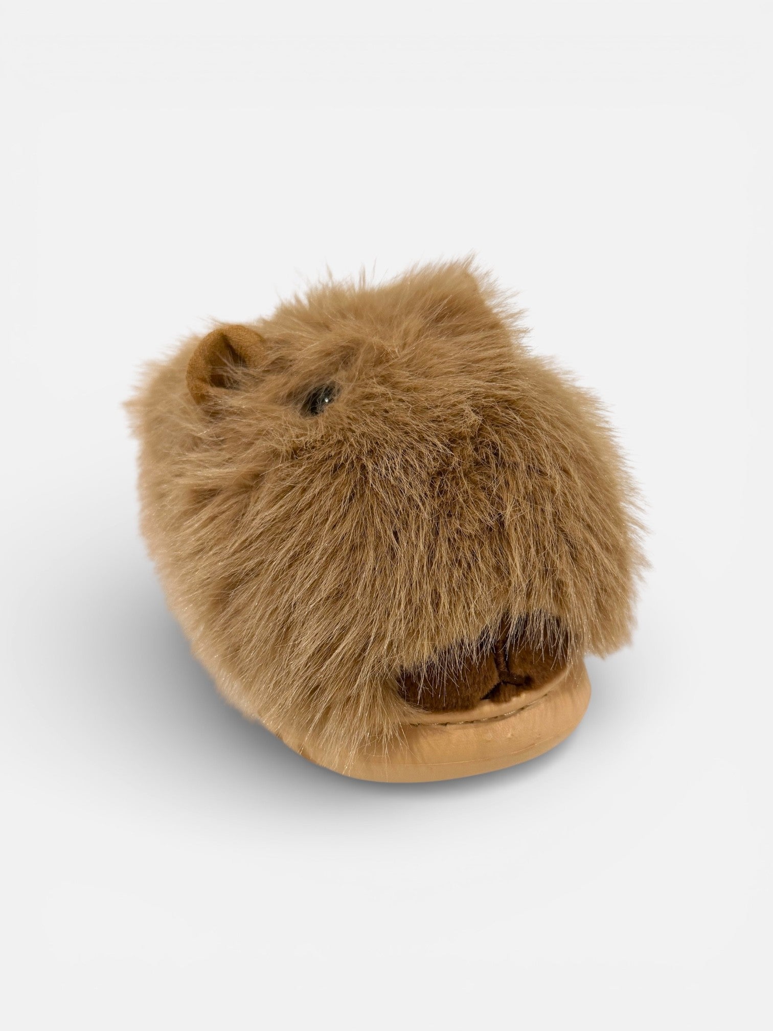 Brown plush toy resembling a Capybara
