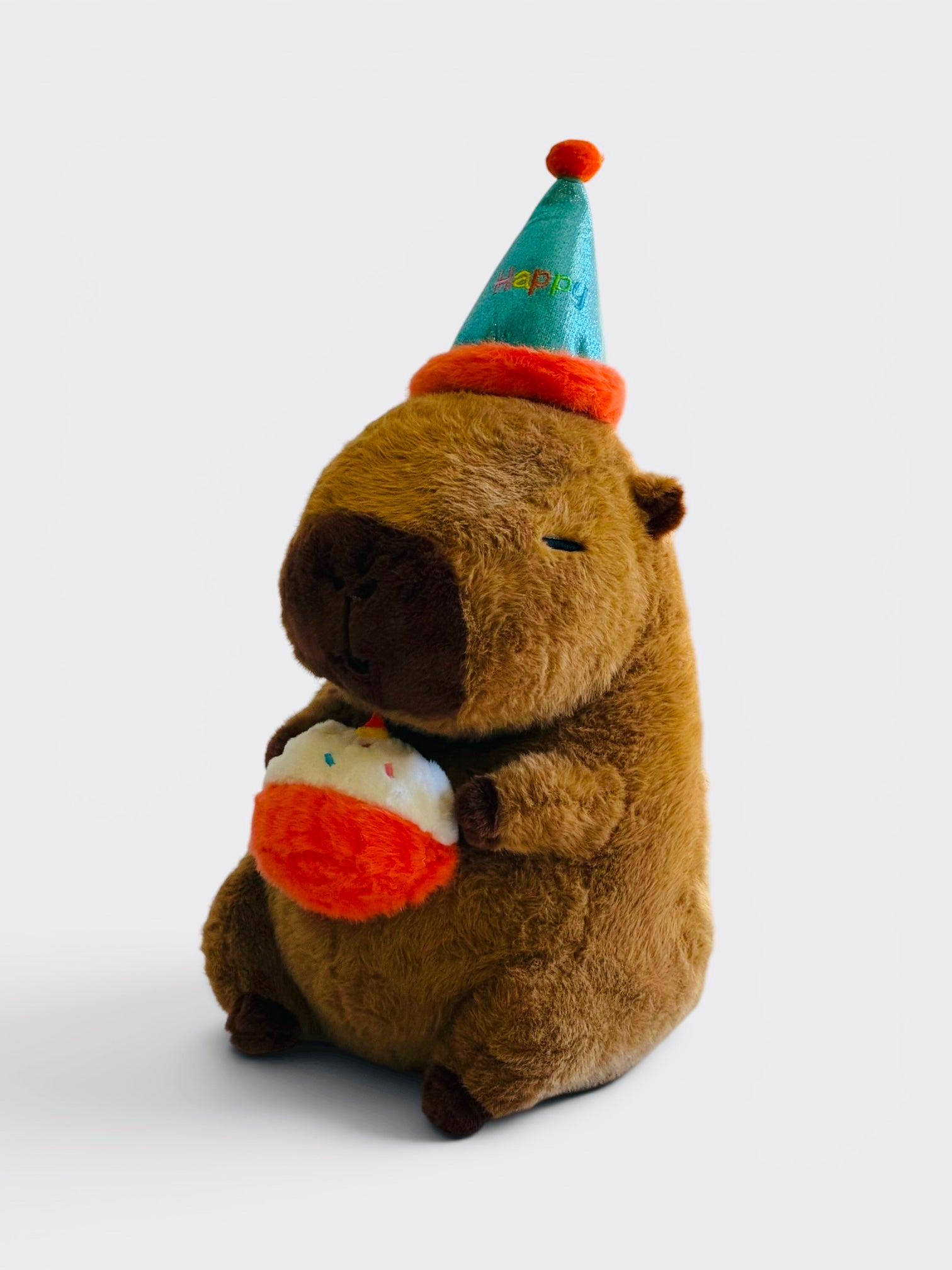 Capybara Plush holding a Boba tea with a Happy hat. From Australia’s biggest Capybara toy store. Check out our range for the very latest Capy products, the best Capybara gifts and general Capy happiness. 