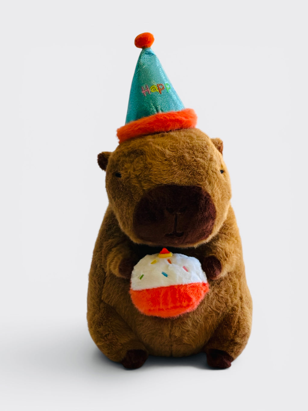 Capybara Plush holding a Boba tea with a Happy hat. From Australia’s biggest Capybara toy store. Check out our range for the very latest Capy products, the best Capybara gifts and general Capy happiness. 